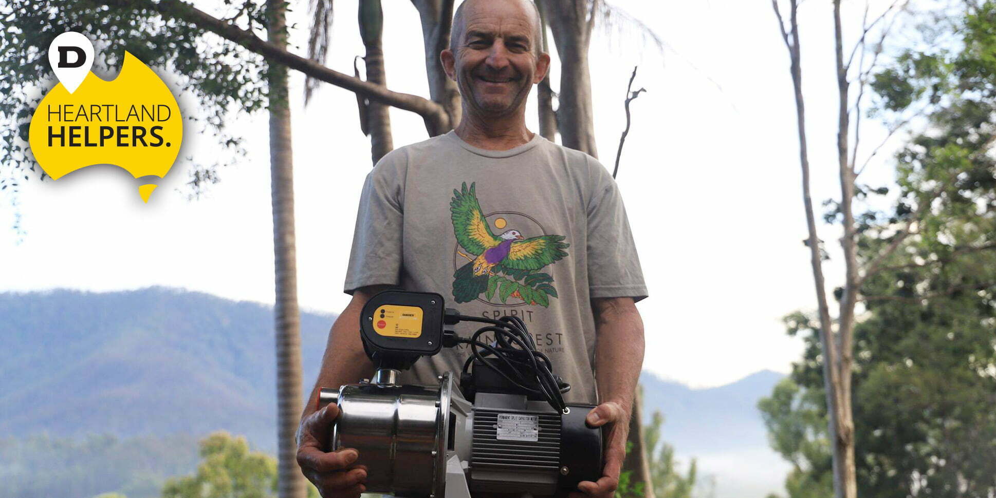 man holding the water pump donated by Davey